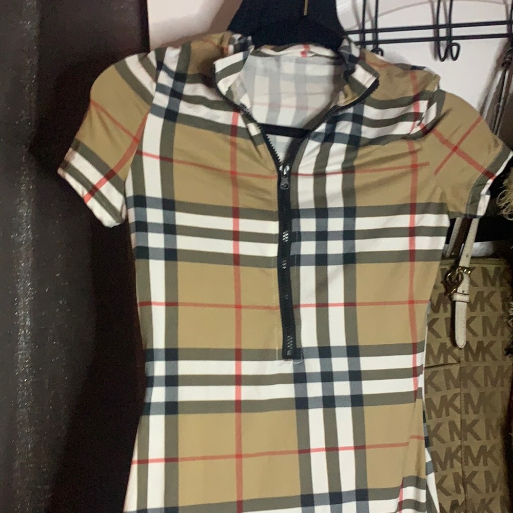 Similar to Burberry mini dress with zipper.